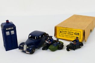 Dinky Toys - A small group of unboxed Dinky Toys contained with a 42b Police Motor Cycle trade box.