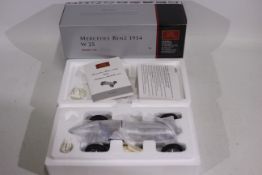 CMC - A boxed 1934 Mercedes Benz W25 Grand Prix car in 1:18 scale # M-033.