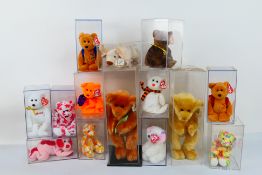 Ty Beanie Babies - Fourteen Ty Beanie Babies in plastic display cases.