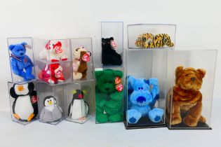 Ty Beanie Babies - Thirteen Ty Beanie Babies in plastic display cases.