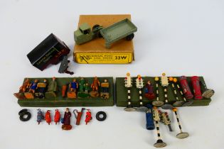 Dinky Toys - A Dinky Toys Mechanical Horse with a group of Dinky Toys accessories.