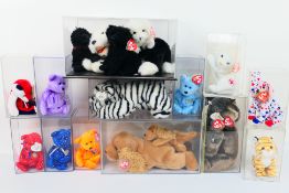 Ty Beanie Babies - Fifteen Ty Beanie Babies in plastic display cases.