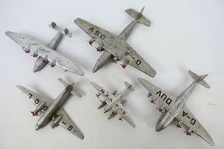 Dinky Toys - Five unboxed Dinky Toys model aircraft.
