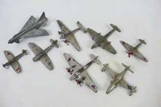 Dinky Toys - Eight unboxed Dinky Toys model aircraft.