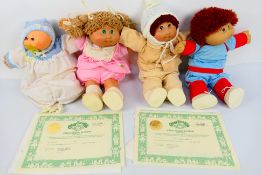 Cabbage Patch Kids - 4 x vintage Cabbage Patch Kids. Appearing in Excellent condition.