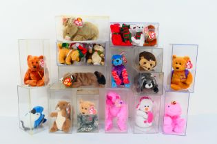 Ty Beanie Babies - Twenty-four Ty Beanie Babies in plastic display cases.