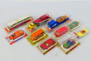 Majorette - A group of 10 x boxed vehicles including Volkswagen Bus, Datsun 260Z, Volkswagen Beetle,