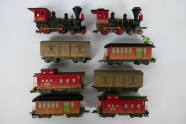 Hornby - Pixar - 2 x Toy Story steam locomotives with wagons and coaches.