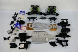 Kyosho - Other - A group of mainly loose predominately Kyosho RC car parts.