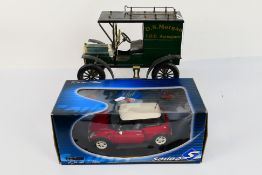 Solido - A boxed Mini Cooper in 1:18 scale # 8080 and a vintage style pressed metal Ford Model T