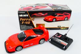 Nikko A boxed vintage 1:18 scale Nikko RDC-18150 radio control Ferrari F40.