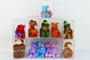 Ty Beanies - 12 Ty Beanies housed within 9 perspex display cases.