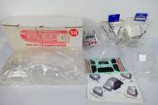 Kyosho - CEN Racing - Three unboxed RC body shells probably in 1:10 scale.