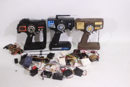HiTec - Carson - Others - Three unboxed RC controllers with a quantity of loose / spare parts