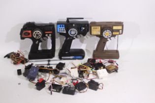 HiTec - Carson - Others - Three unboxed RC controllers with a quantity of loose / spare parts