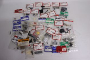 Kyosho - A large quantity of Kyosho spare parts suitable for RC car modelling.