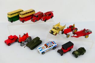 Dinky - Corgi - A group of unboxed models including Massey Harris tractor and spreader # 27a & #