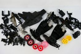 Kyosho - Other - A quantity of loose Kyosho electric RC chassis,