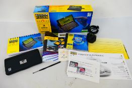 A boxed PSION Series 5 Hand held computer. Comes within an opened clear see through bag.