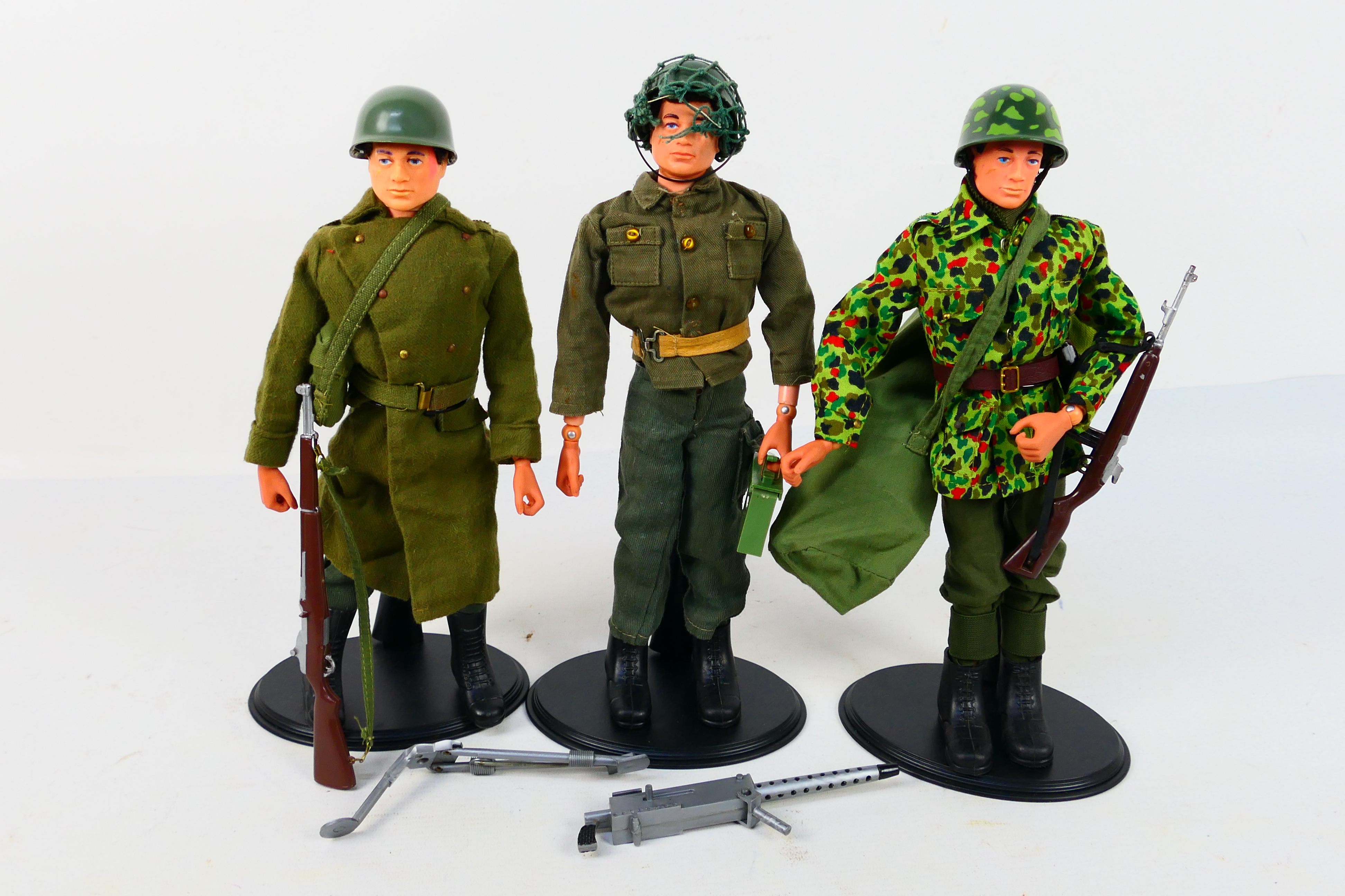 Palitoy - Action Man - 3 x vintage flock hair Action Man figures on stands.