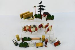 Britains - A collection of Britains Farm items including 8 x cows, 2 x figures, a tree,