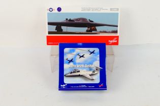 Herpa - Two boxed Herpa diecast military aircraft models.