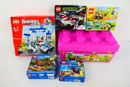 Lego - A group of boxed Lego sets.