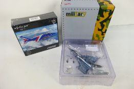 Herpa - Premium X - Two boxed diecast 1:72 scale military aircraft models.
