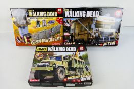 McFarlane - Three boxed McFarlane 'The Walking Dead' building sets.