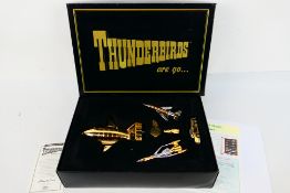 Matchbox Collectibles - A boxed Limited Edition Matchbox Collectibles 'Thunderbirds Are Go' gold