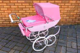 Silver Cross Toy Pram Baby Carriage - A pink Silver Cross Oberon toy pram with hood, apron,