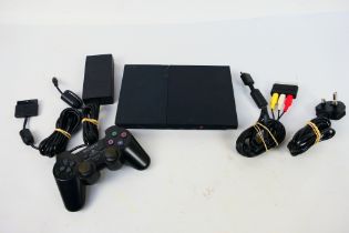 Sony - Playstation - An unboxed Playstation 2 Console - Lot also consists of AC Adaptor,