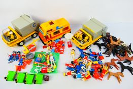 Playmobil - An unboxed group of vintage Playmobil toys, figures and accessories.