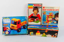 Palitoy - Matchbox - Tonka - Kohner - Four boxed vintage toys.