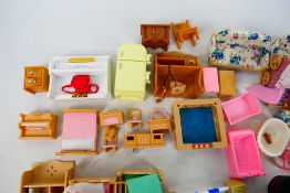 Sylvanian Families - A group of unboxed vintage Sylvanian Families accessories.