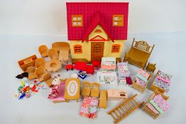 Sylvanian Families - A group of unboxed vintage Sylvanian Families toys and accessories.