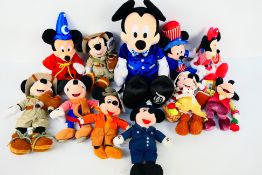 Disney - A group of Disney Mickey Mouse related soft toys.