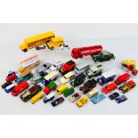 A mixed lot of approximately 40 unboxed diecast models,