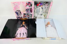Mattel - Barbie - A trio of boxed Barbie dolls.