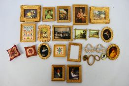 Miniature gilt framed pictures - a collection of 1:12 scale gilt framed pictures