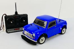 Kyosho - Tamiya - An unboxed Kyosho 1:10 scale electric RC with Tamiya Mini Pick-Up body shell.