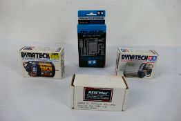 Tamiya - Other - Three boxed RC car model electric motors with a boxed Speed Controller.