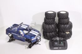 Kyosho - An unboxed Kyosho 1:10 scale nitro RC QRC 'Wild Dodge Ram' Monster Truck.