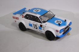 Kyosho - An unboxed Kyosho 1:10 scale electric RC Skyline 2000 GT-R Racing.