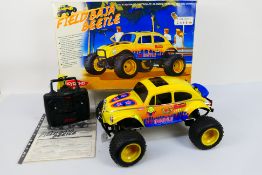 Kyosho - A partially boxed and constructed Kyosho 31681 1:10 scale nitro RC .