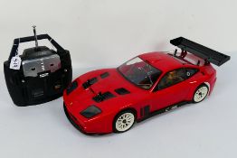 Kyosho - An unboxed Kyosho 1:10 scale nitro RC Ferrari 575 GTC.