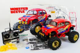 Tamiya - A boxed and constructed vintage Tamiya #58618 1:10 scale electric RC 'Monster Beetle' .