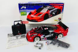 Kyosho - A boxed and constructed Kyosho 31831 1:10 scale nitro RC PureTen Spider 2WD McClaren F1