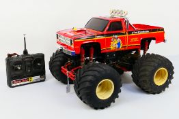 Tamiya - An unboxed vintage Tamiya 1:10 electric RC 'Clod Buster' Monster Truck.