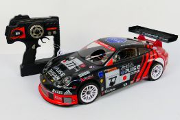 Kyosho - An unboxed Kyosho 1:10 scale nitro PureTen GP Spider MkII World Cup Edition chassis with